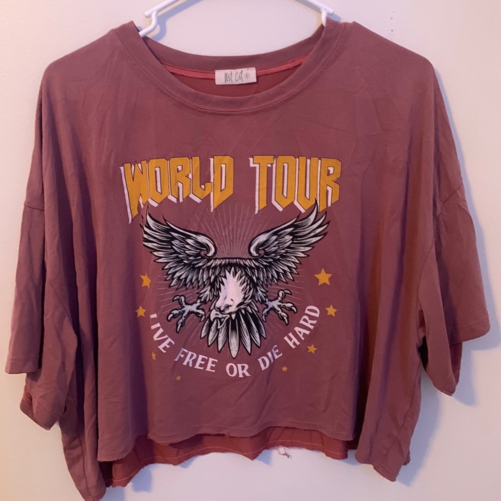 • Wst Cst Maroon Colored Crop Top with World Tour Writing and Eagle Logo •